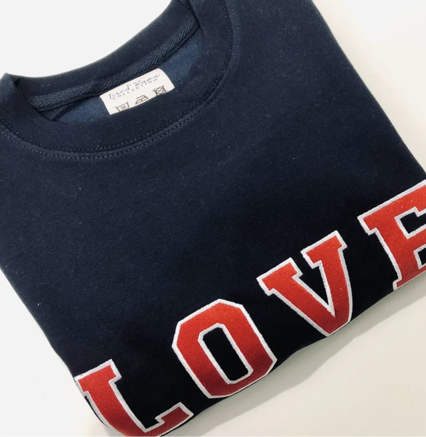 Embroidered Love Varsity Jumper | Navy